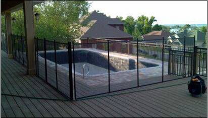 Down one side of a negative edge pool and on a raised composite deck.